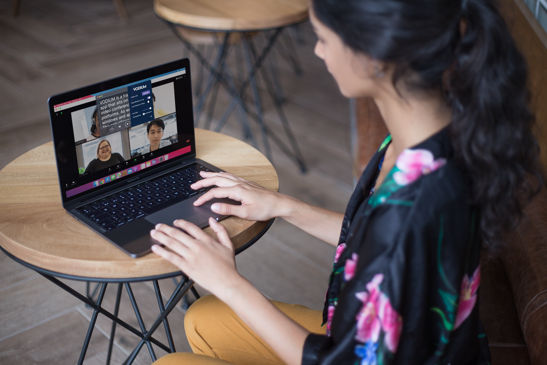 woman-working-on-a-macbook-mockup-over-a-coffee-table-a21168